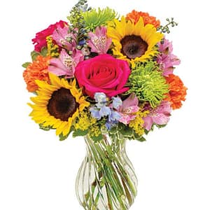 The bright colors of the sunflowers, roses, and carnations